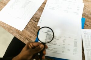 Financial planning documents and charts on a desk showing investment strategies