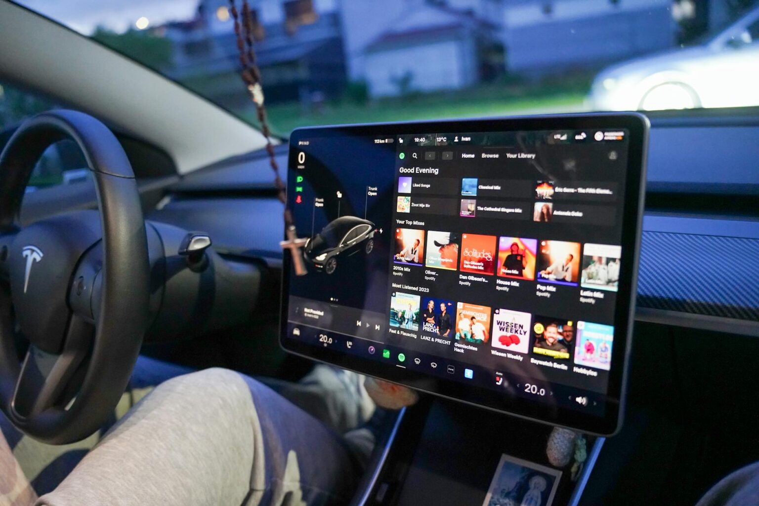 Modern car dashboard with digital display showing software interface and connectivity options