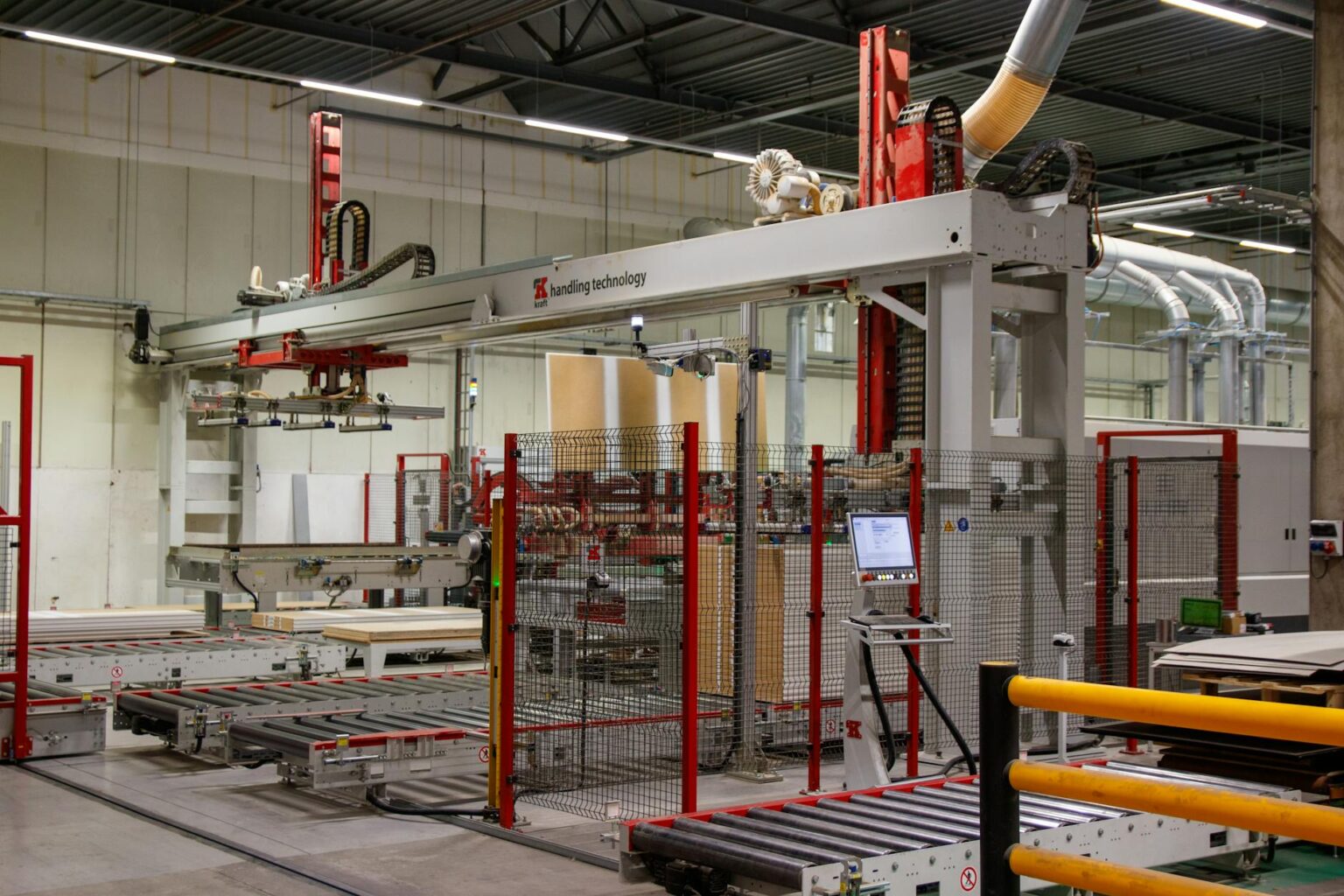 Modern factory assembly line with workers and automated equipment