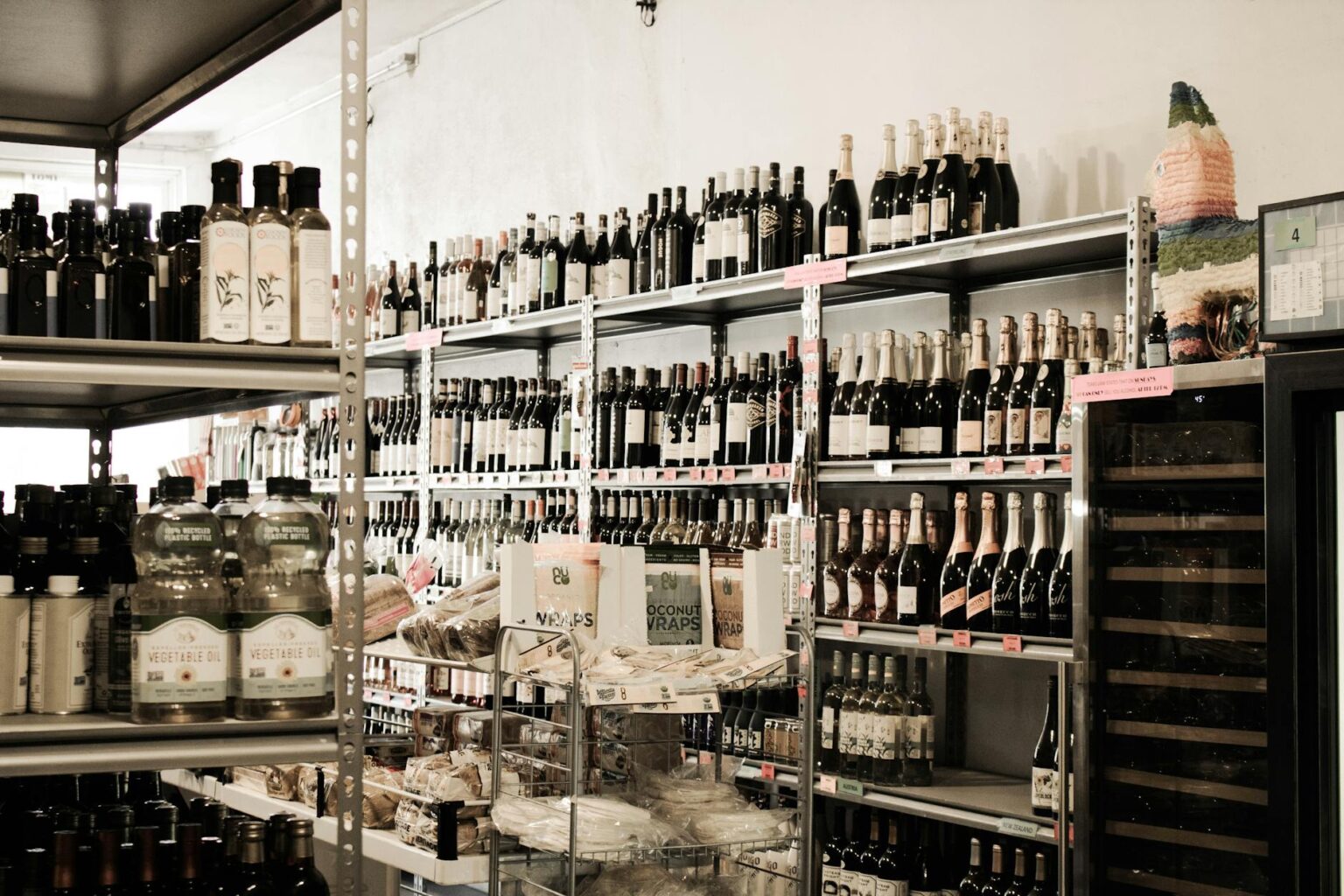 Retail grocery store shelves displaying various private label and national brand products