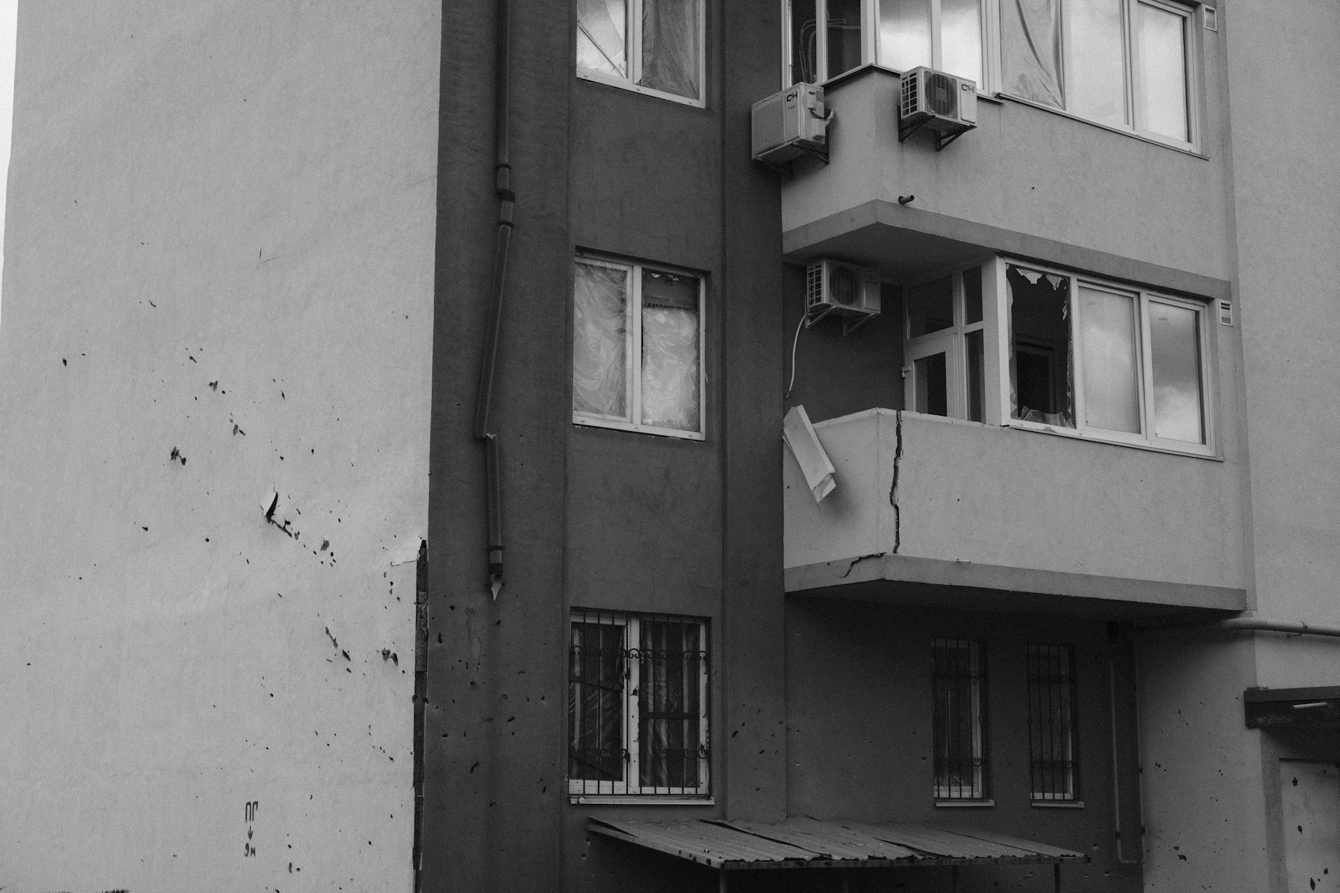 Damaged commercial building showing physical climate impact on corporate assets