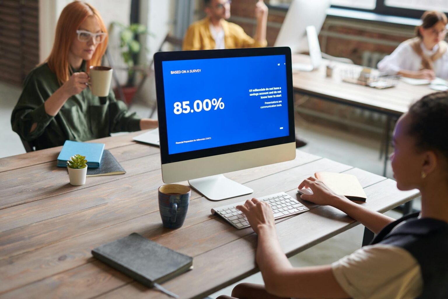 Computer screen displaying data analytics dashboard in modern corporate office