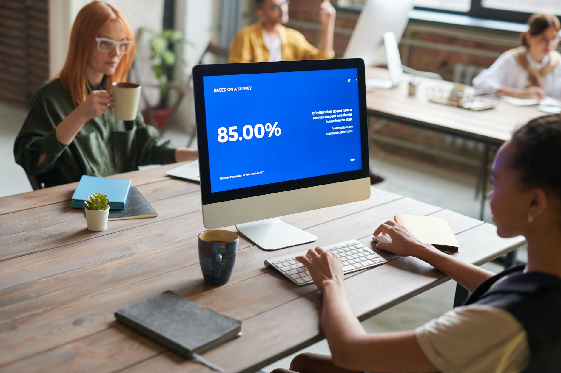 Computer screen displaying data analytics dashboard in modern corporate office