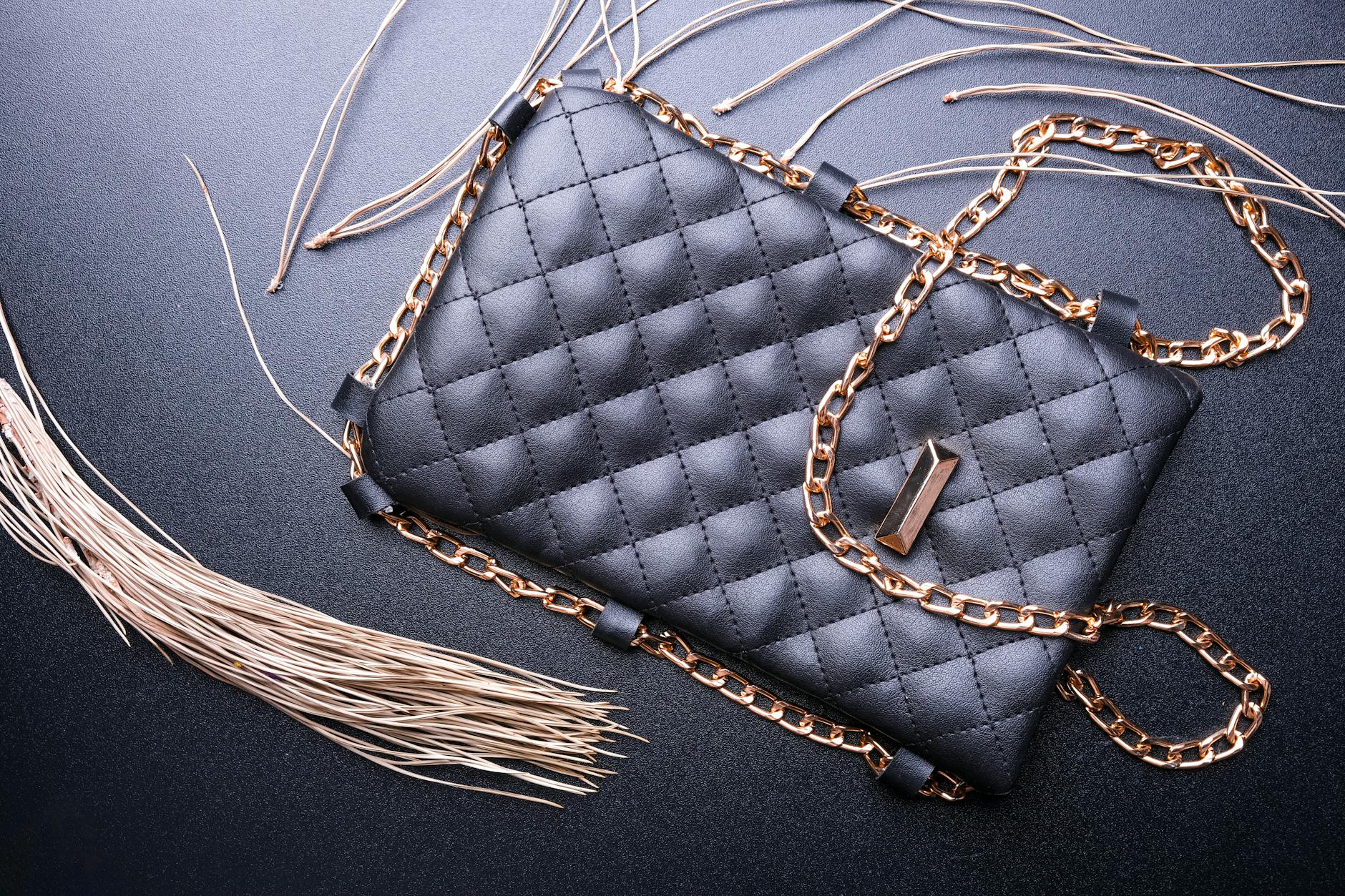 Collection of luxury designer handbags displayed in retail setting
