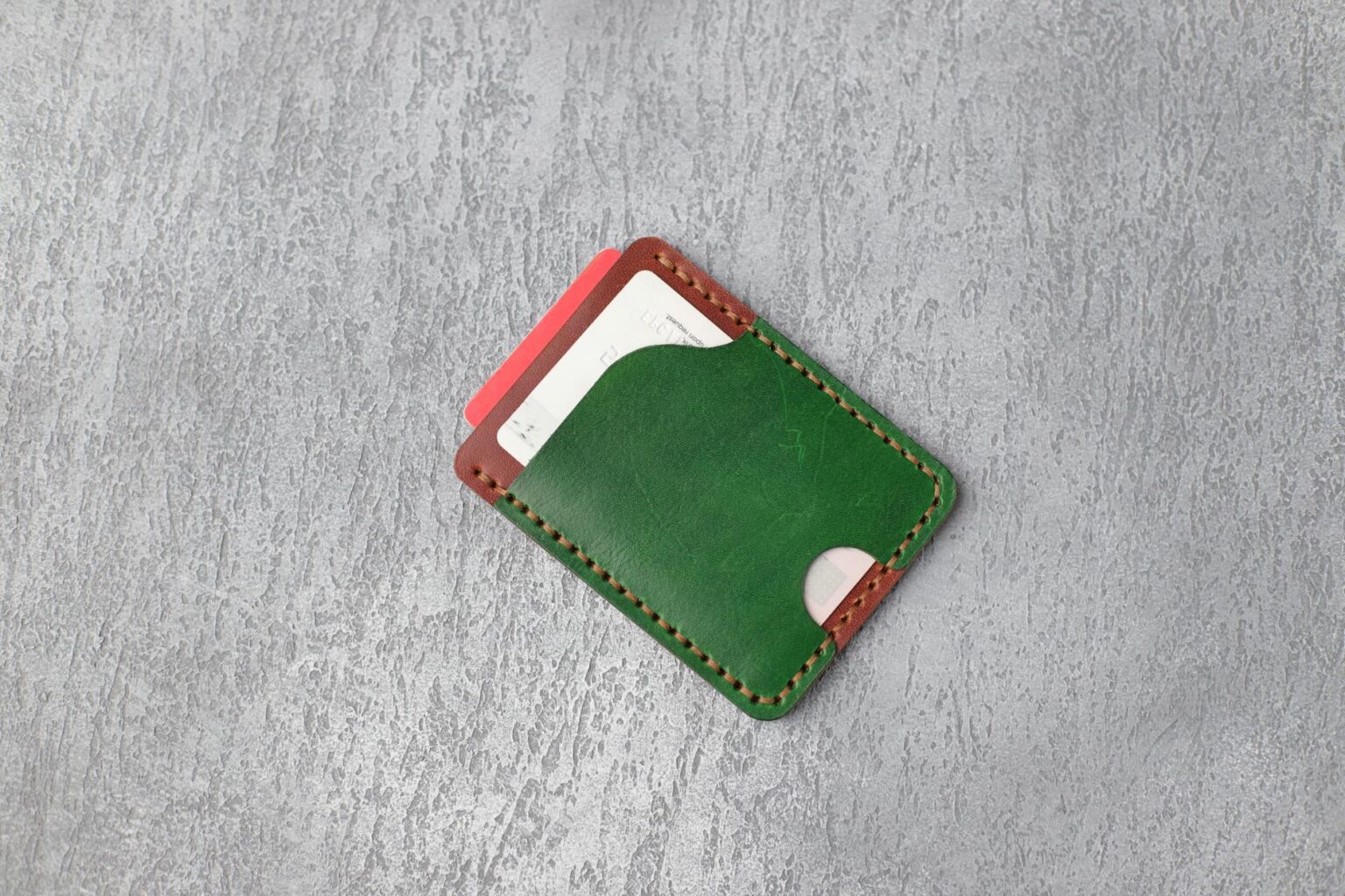 Multiple credit cards arranged in an open wallet showing consumer debt options