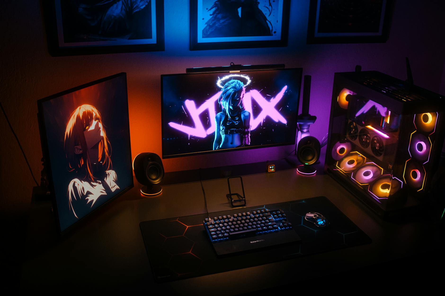 Modern gaming setup with multiple monitors displaying video games