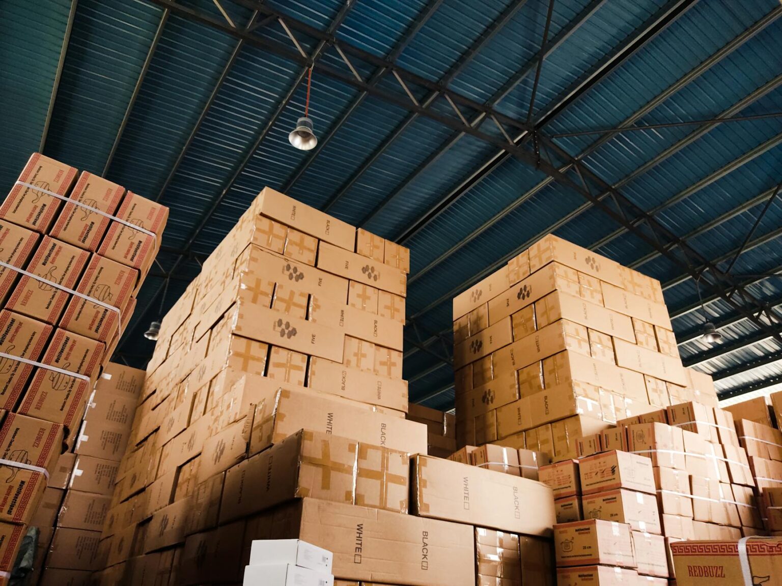 Modern warehouse interior with automated storage systems and robotic equipment
