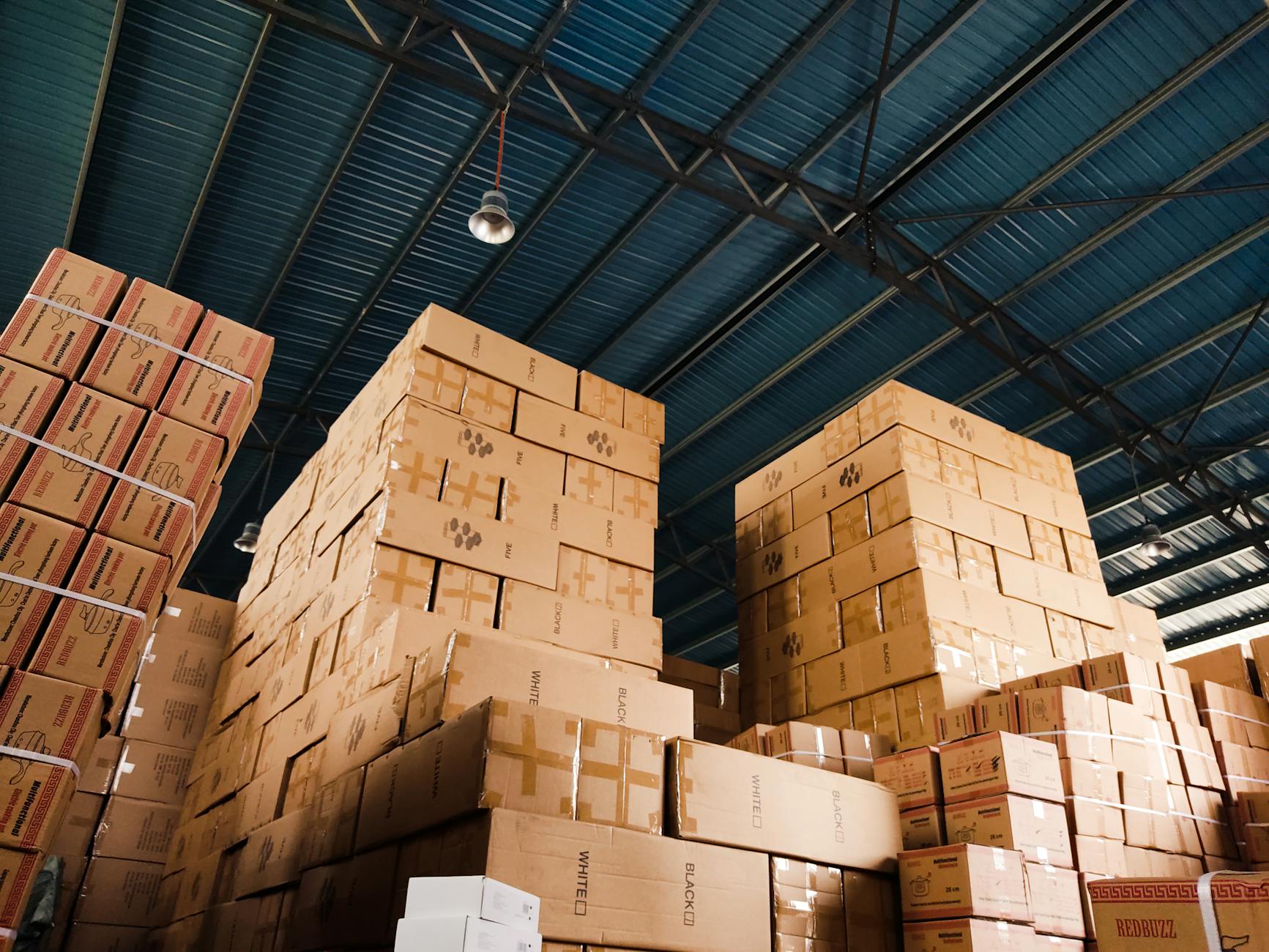 Modern warehouse interior with automated storage systems and robotic equipment