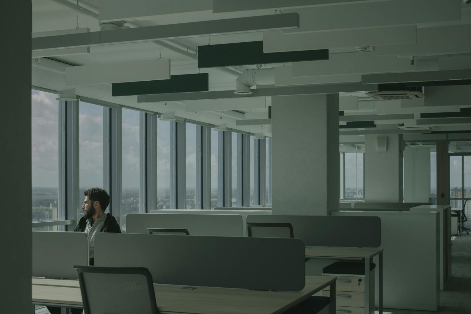Modern office workspace with desk and computer showing business productivity environment