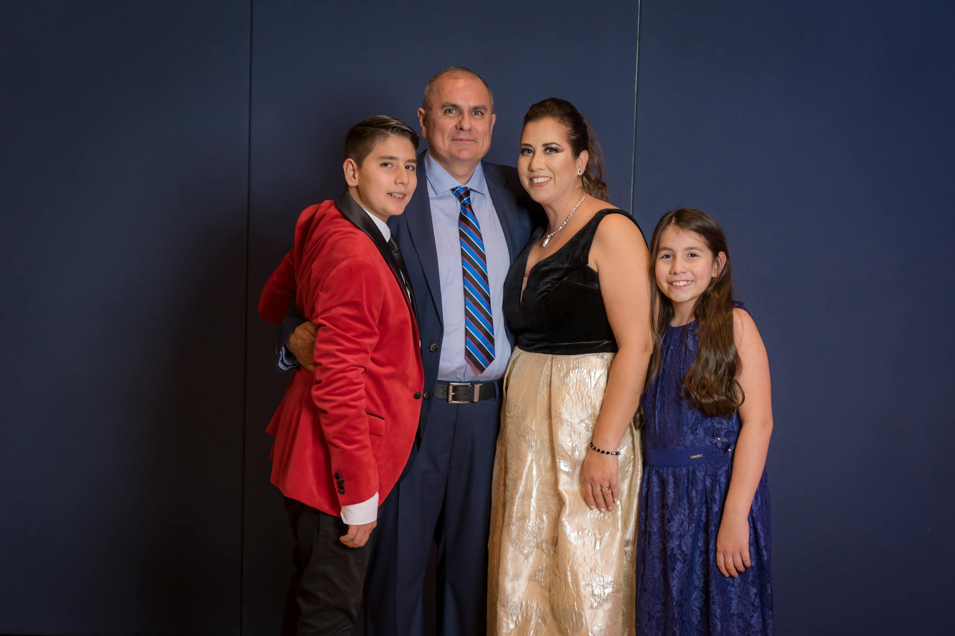 Multi-generational family portrait showing parents, children and grandparents together