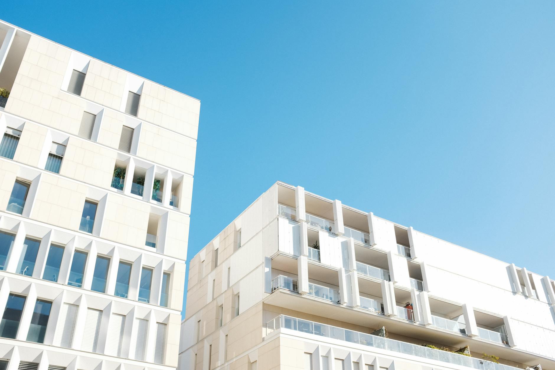 Modern residential apartment building representing the type of properties available through fractional investing platforms