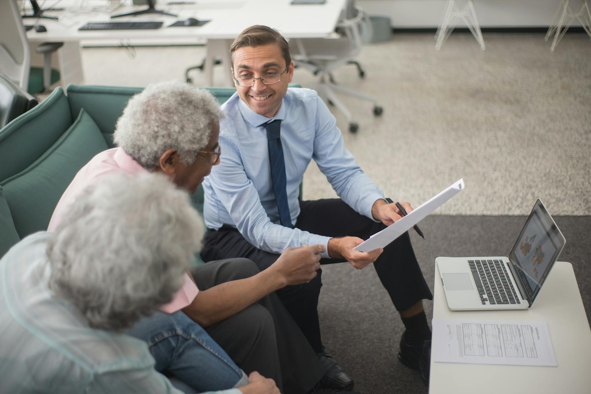 Professional financial advisor discussing investment options with client