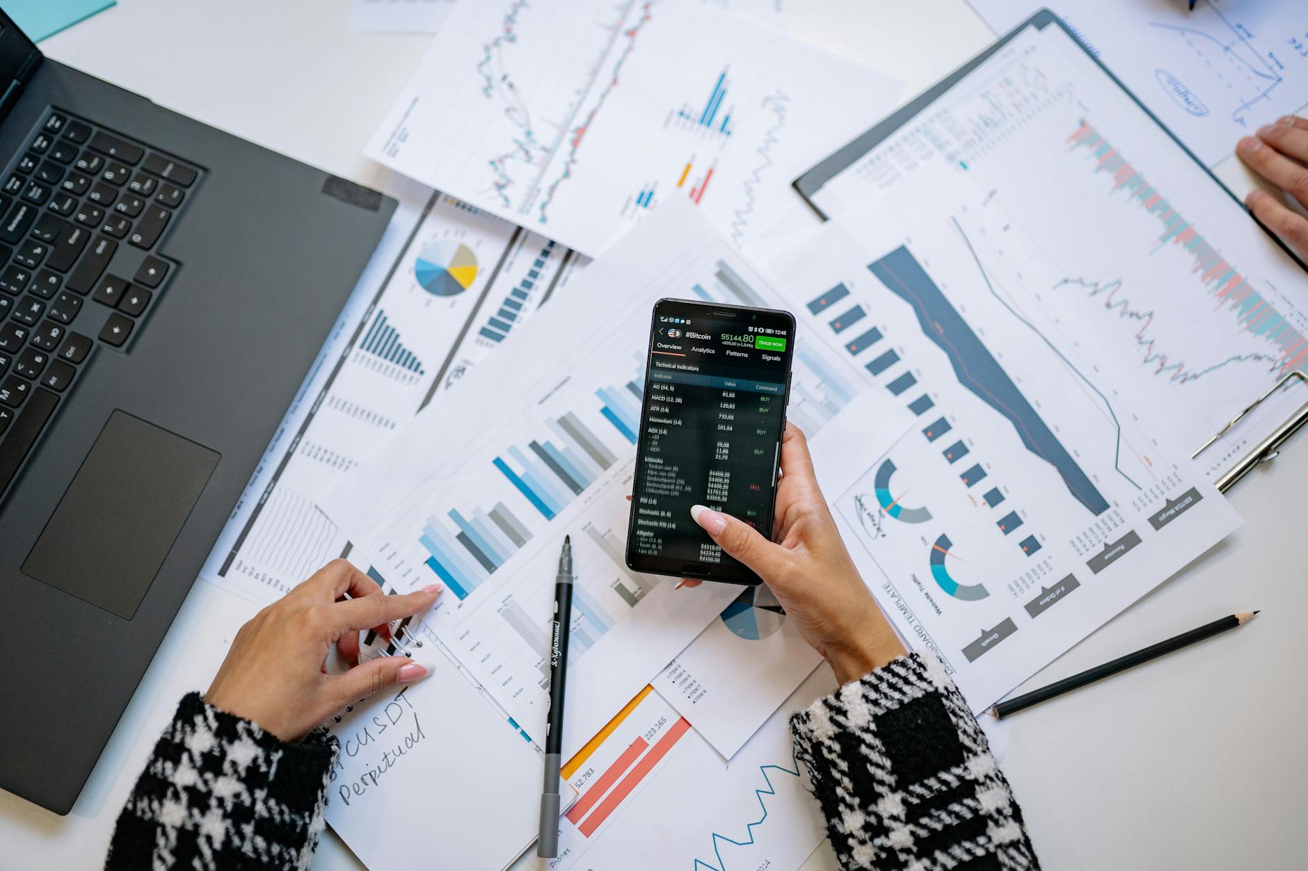 Computer screen displaying data charts and analytics graphs for business intelligence