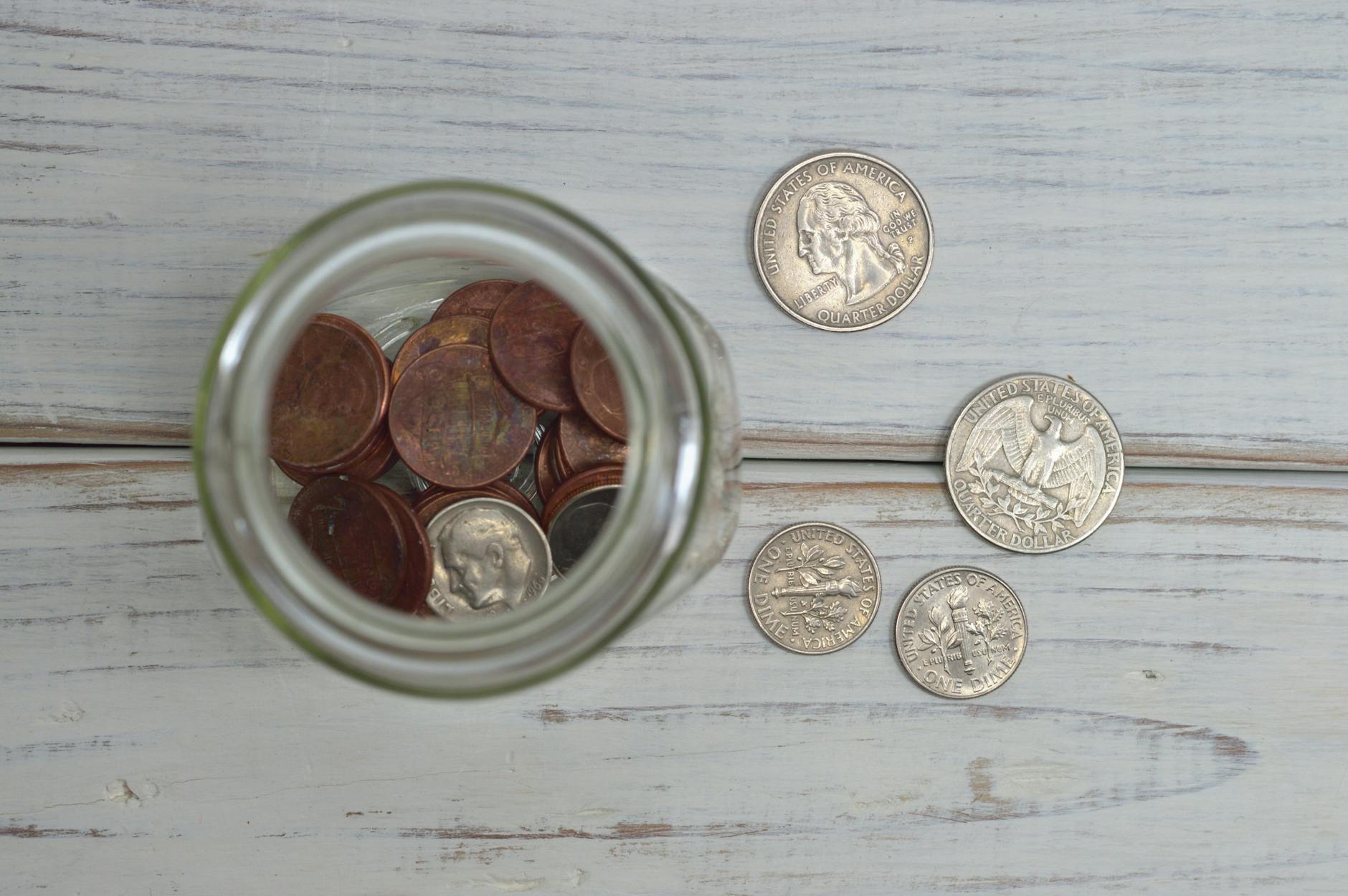 Stack of coins representing microtransaction revenue and profit margins in gaming industry