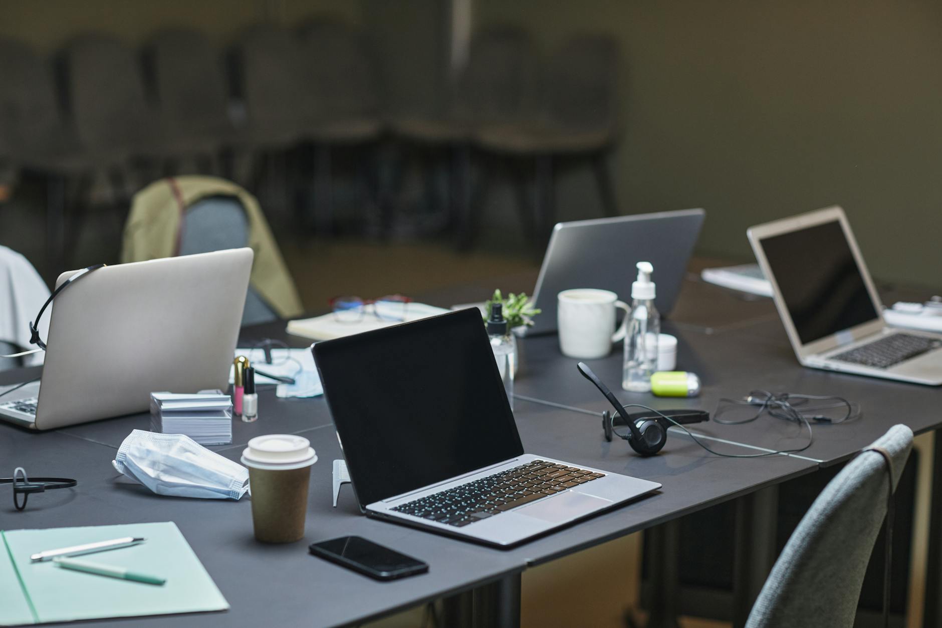 Professional workspace with multiple monitors and gaming peripherals showing business technology integration