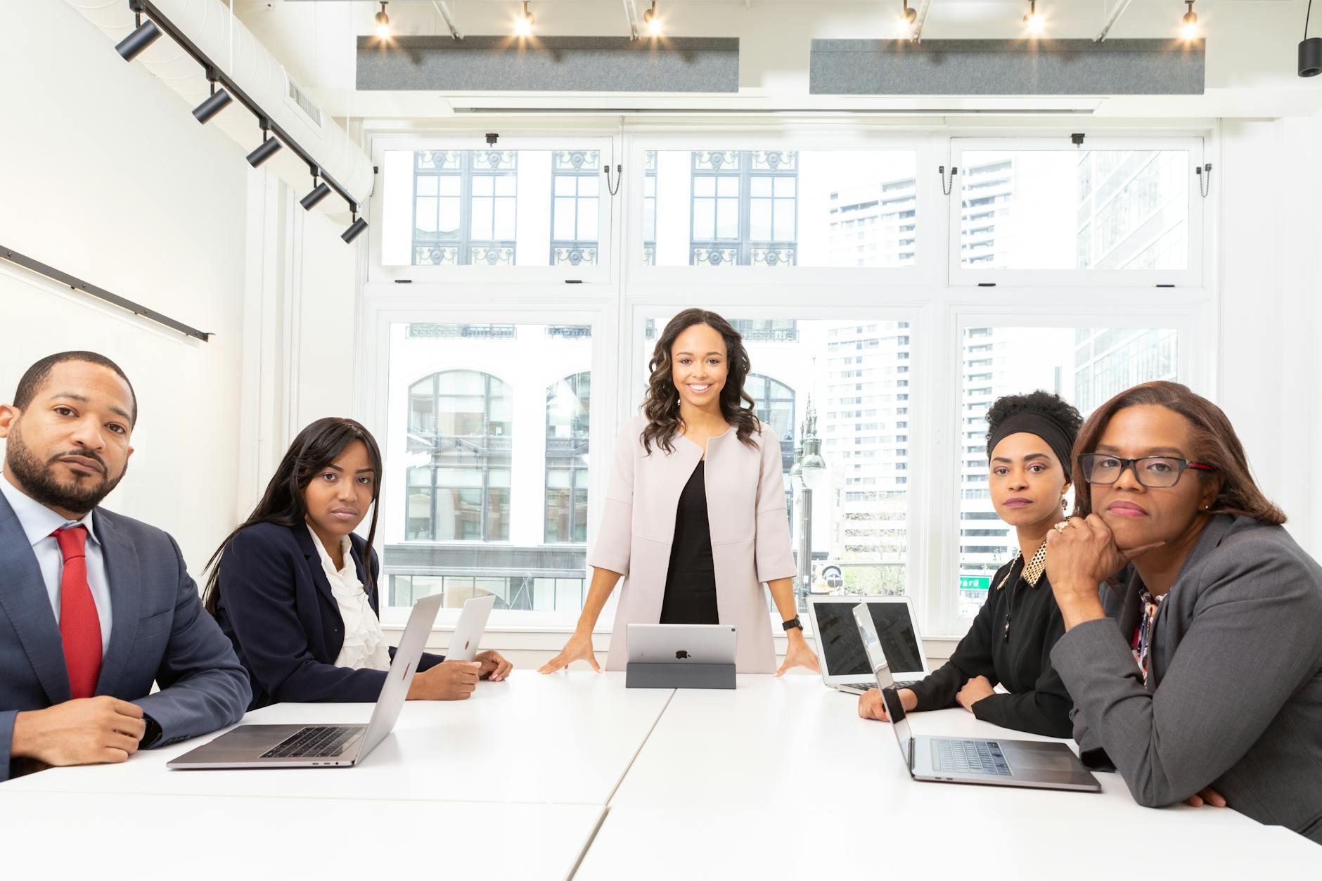 Corporate executives in boardroom discussing strategy