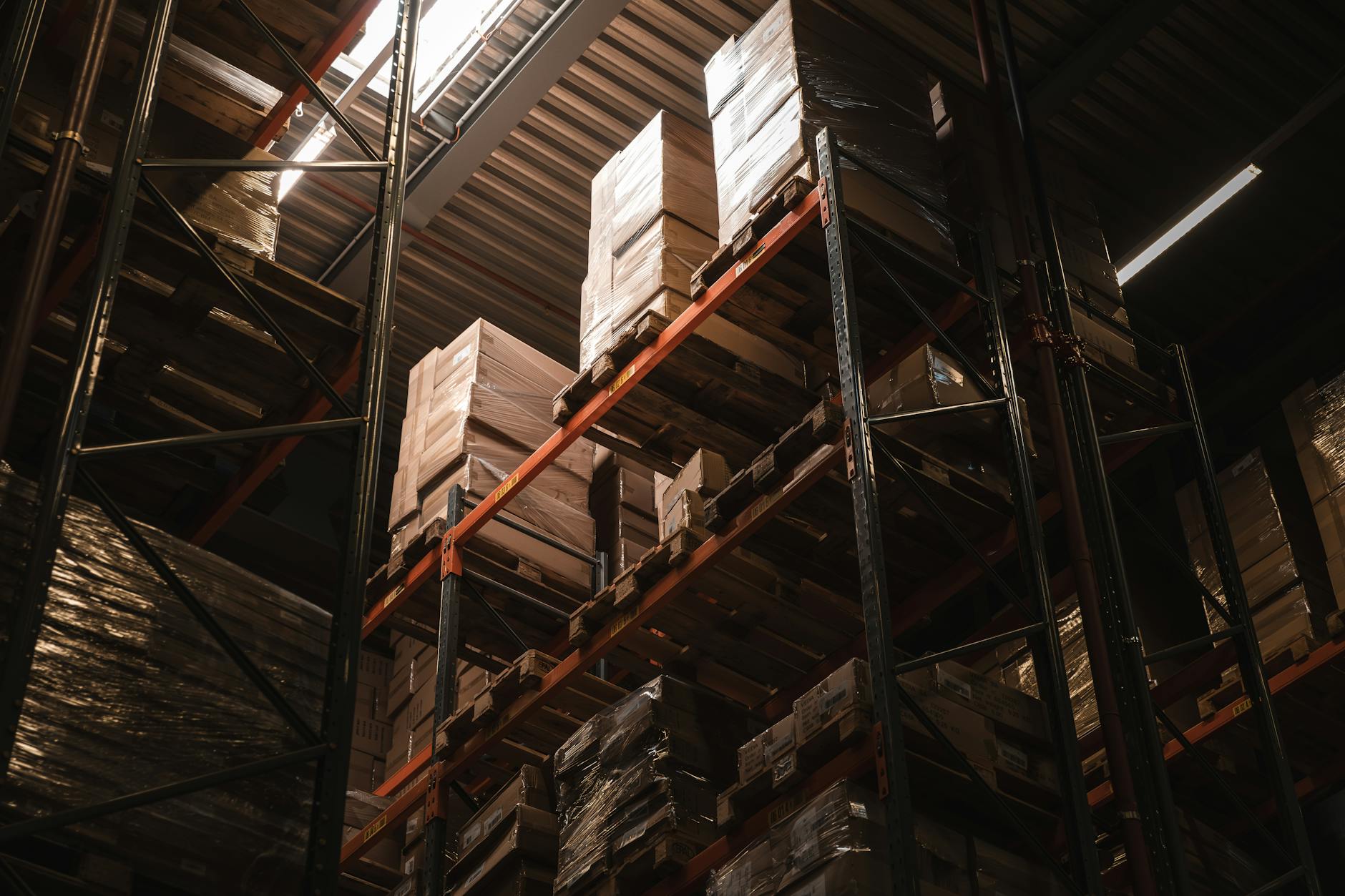 Industrial battery storage facility with large white containers and electrical equipment