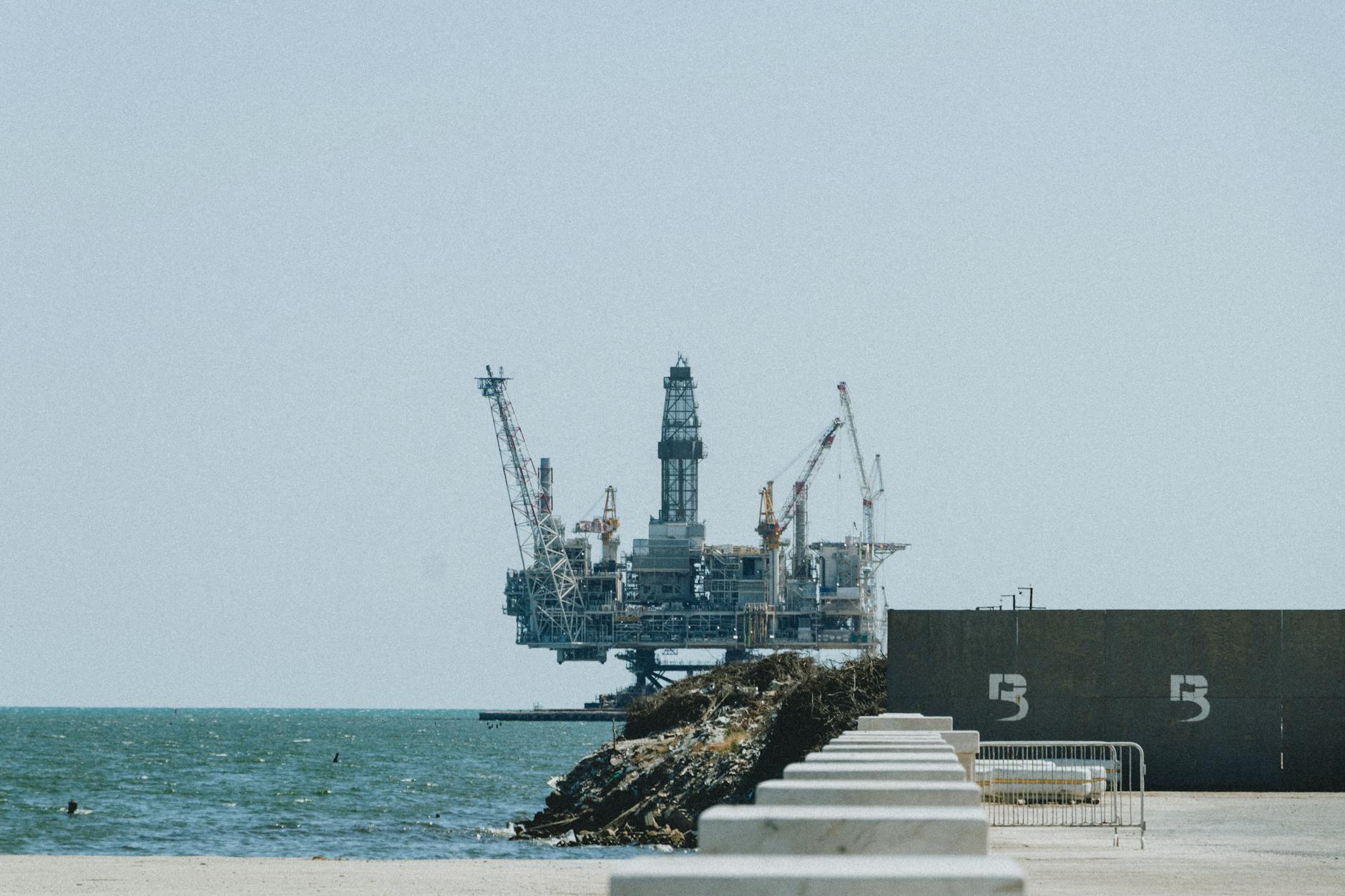 Industrial oil drilling rig operating in field