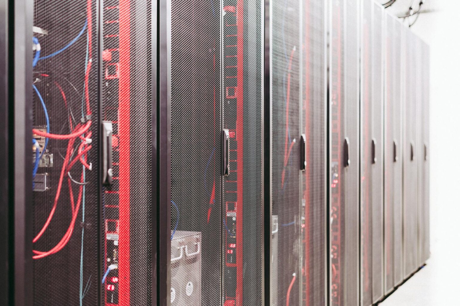 Modern data center server room with blue lighting