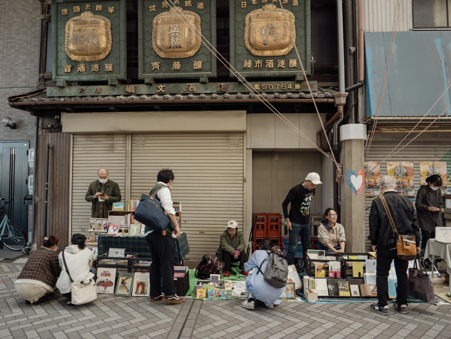 Stack of Japanese books on wooden surface