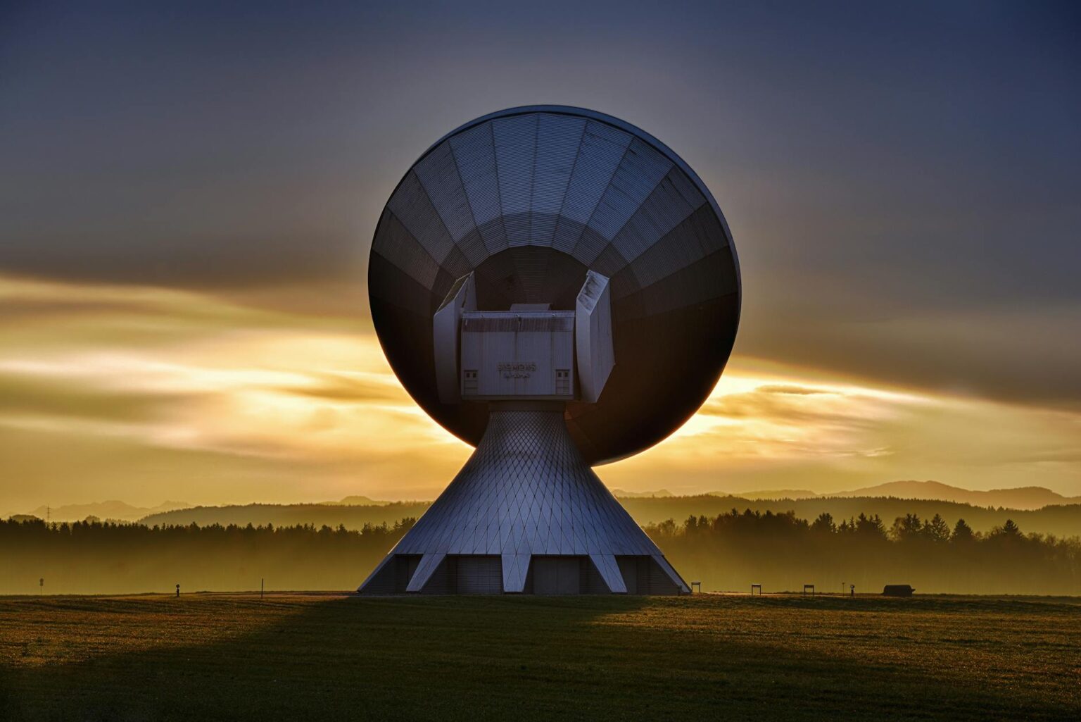 Satellite orbiting Earth against dark space background
