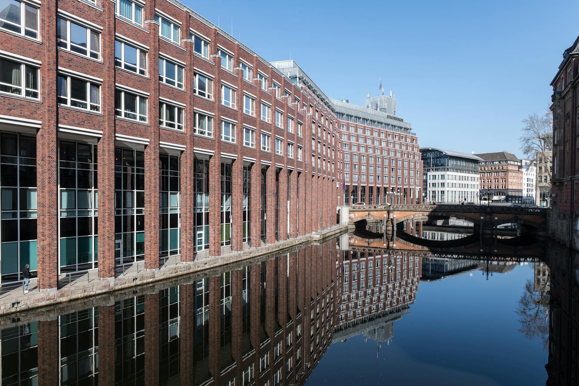 City canal with water flowing through urban environment