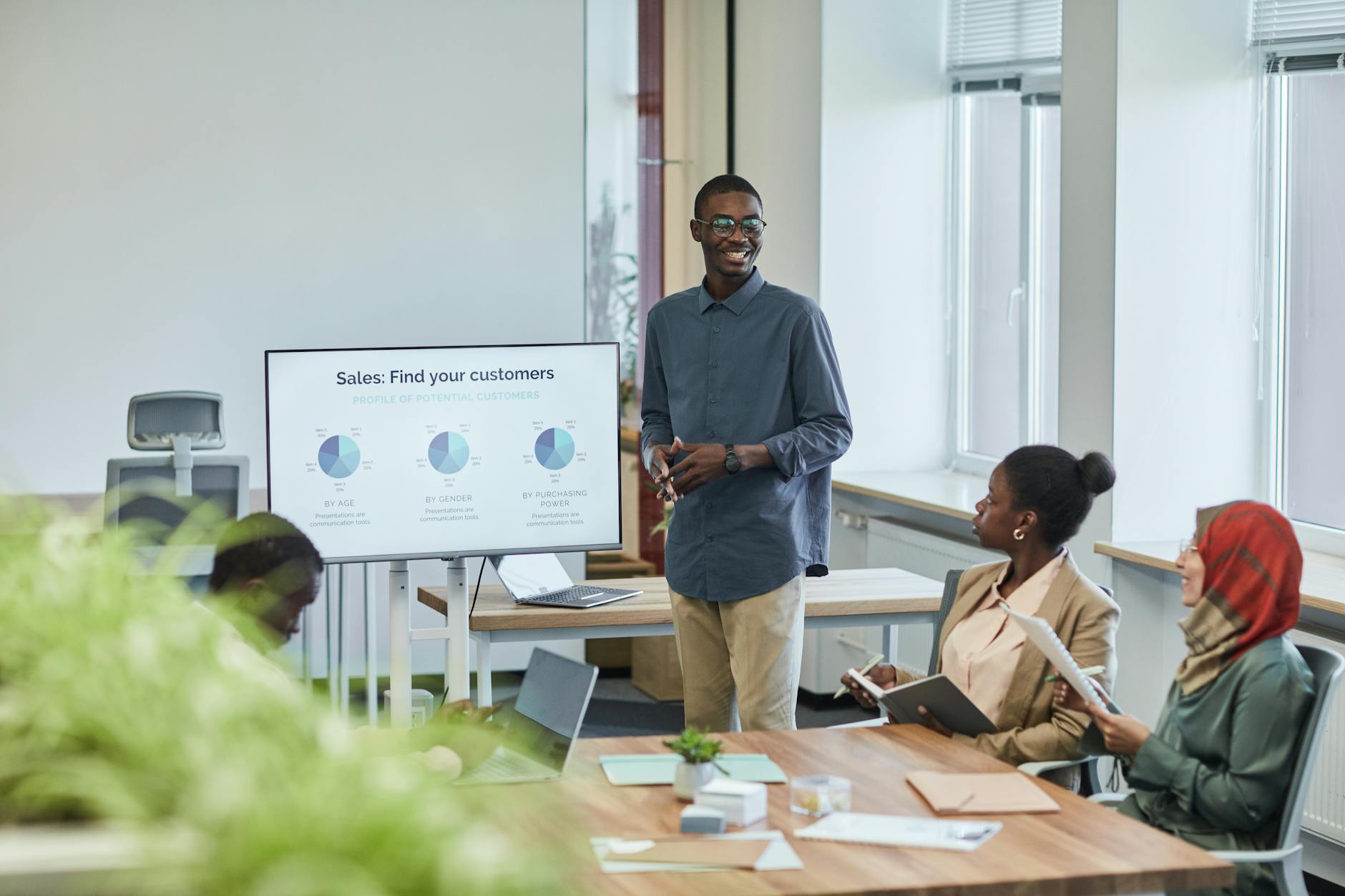 Business professionals reviewing financial charts and investment data