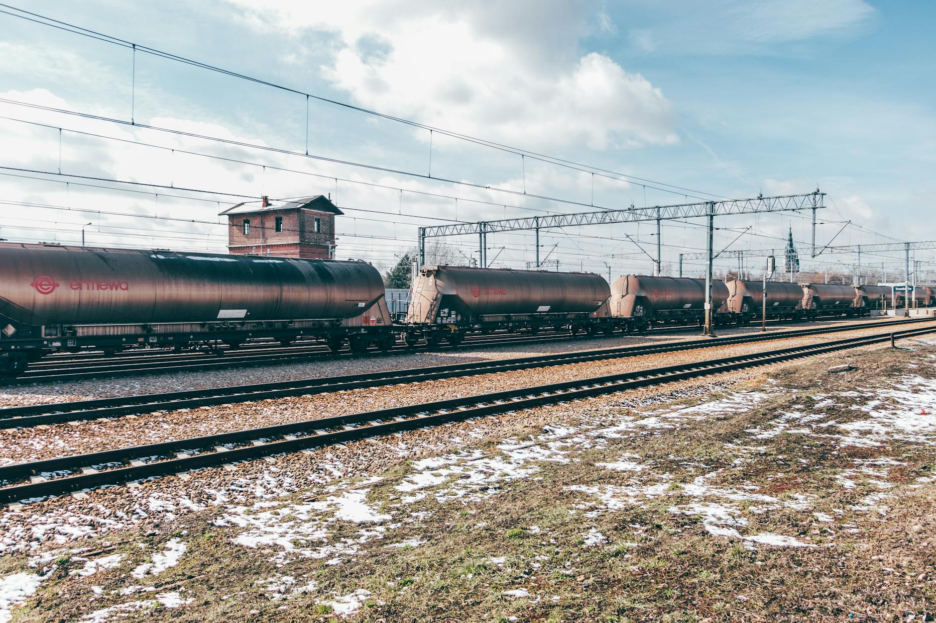 Long freight train carrying cargo containers