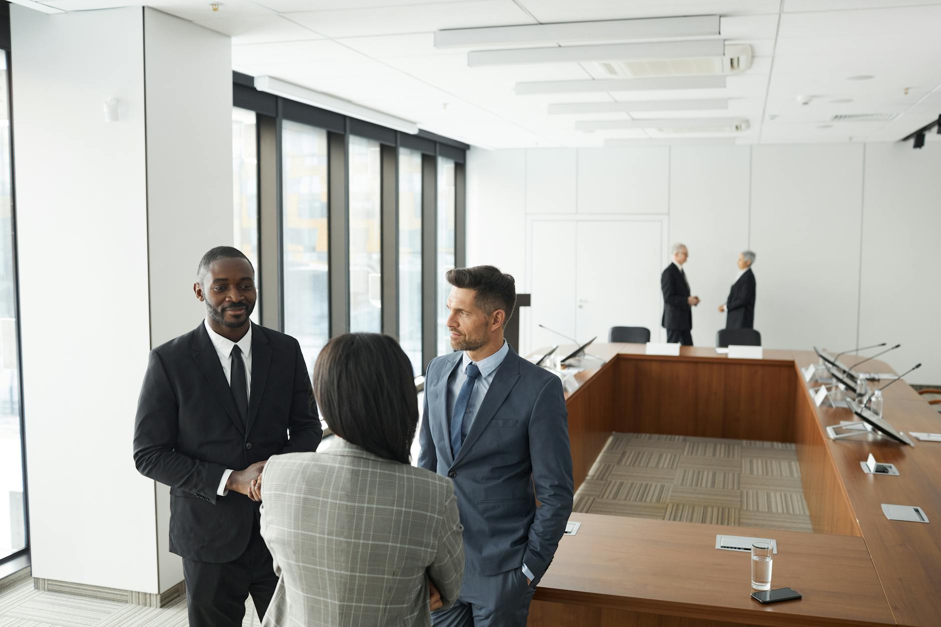 Corporate executives discussing financial strategy and dividend policy