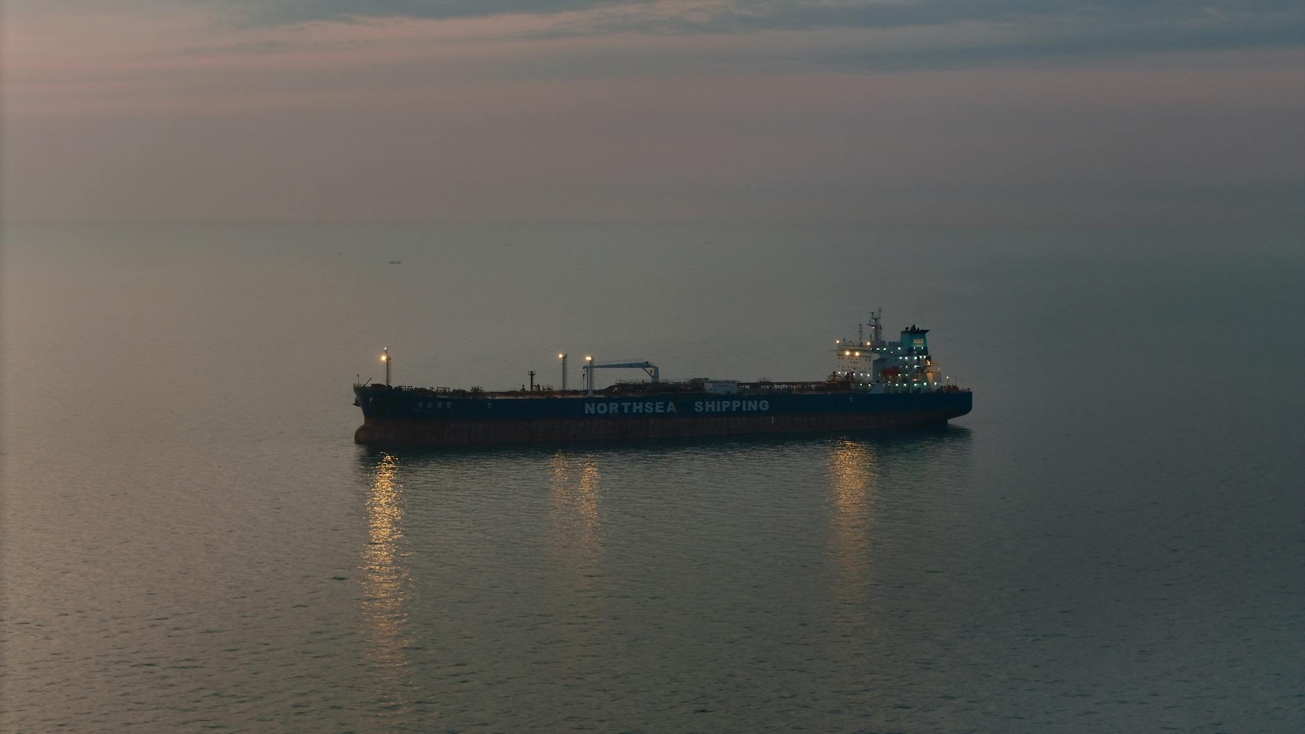 Large oil tanker ship navigating through Gulf waters
