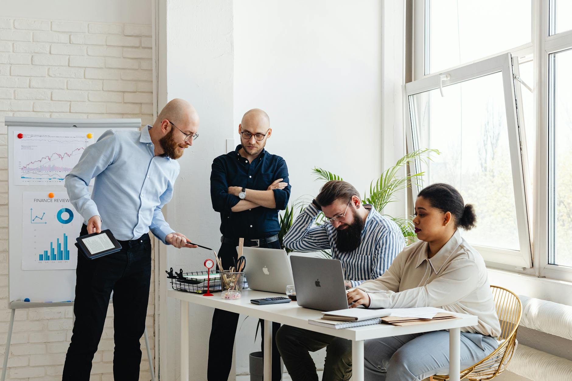 Business professionals collaborating in modern office environment