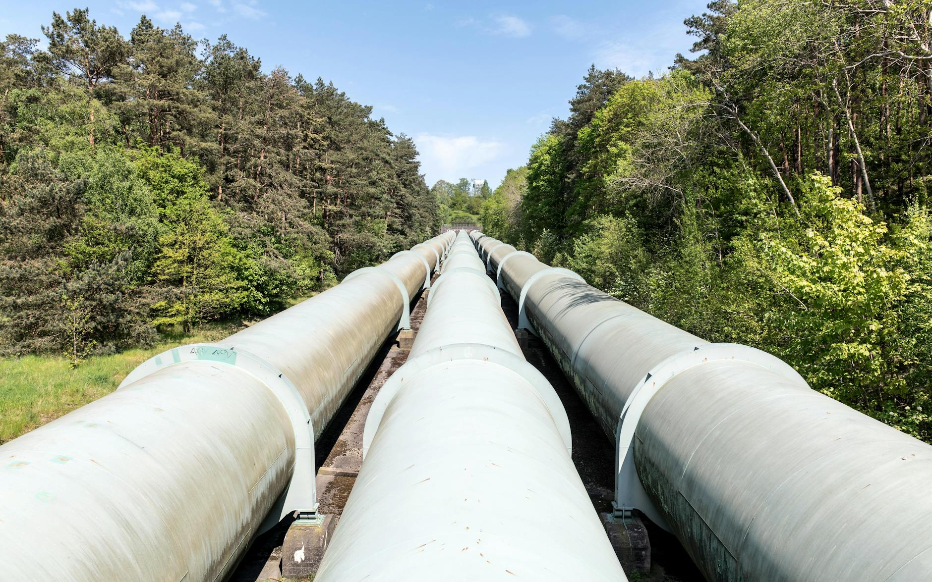 Large oil pipeline infrastructure extending across landscape
