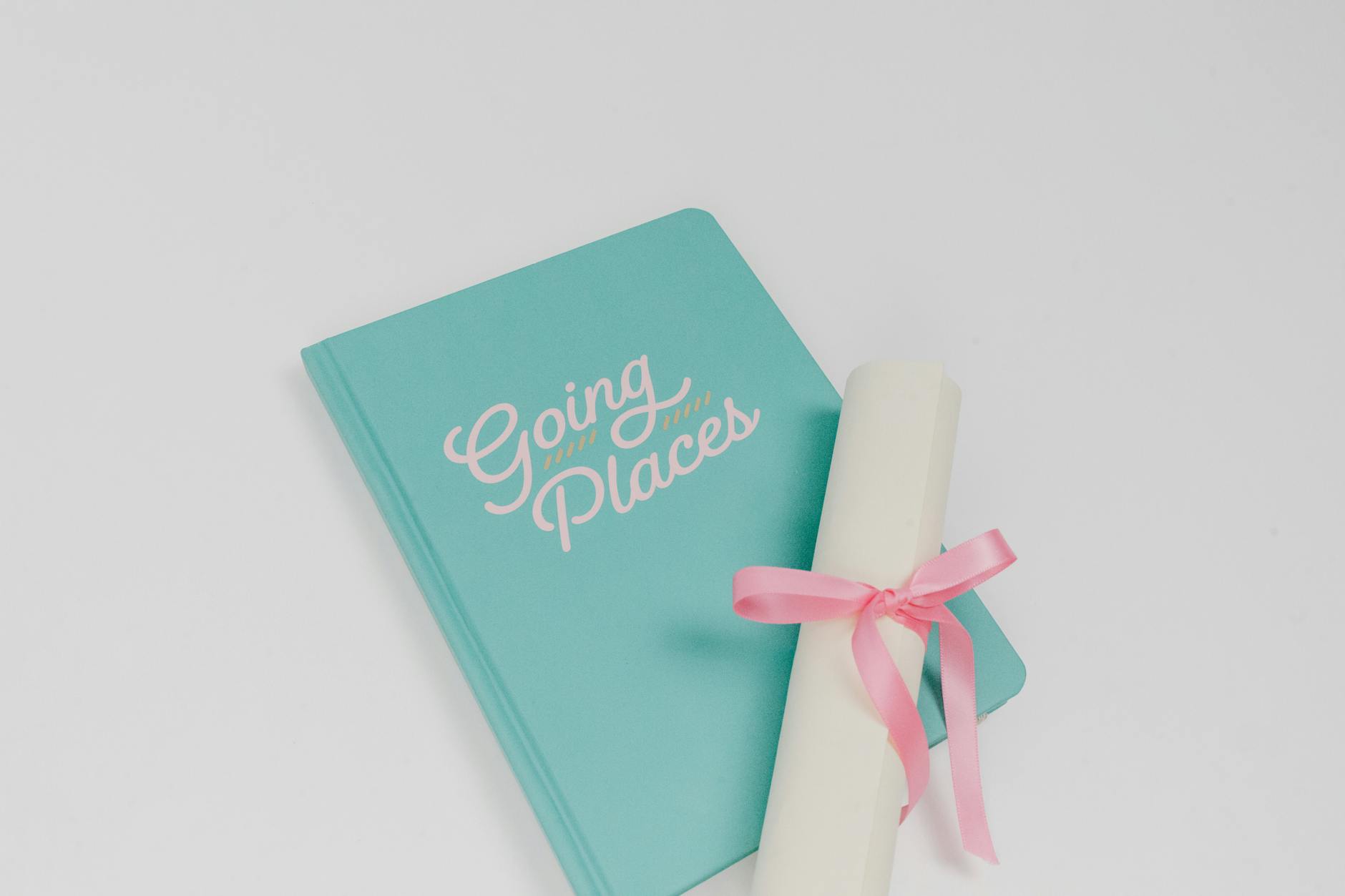 Open notebook with career planning notes and pen on wooden desk