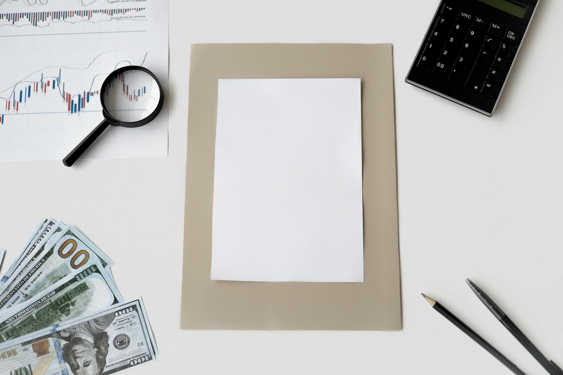 Government budget documents and financial paperwork on desk