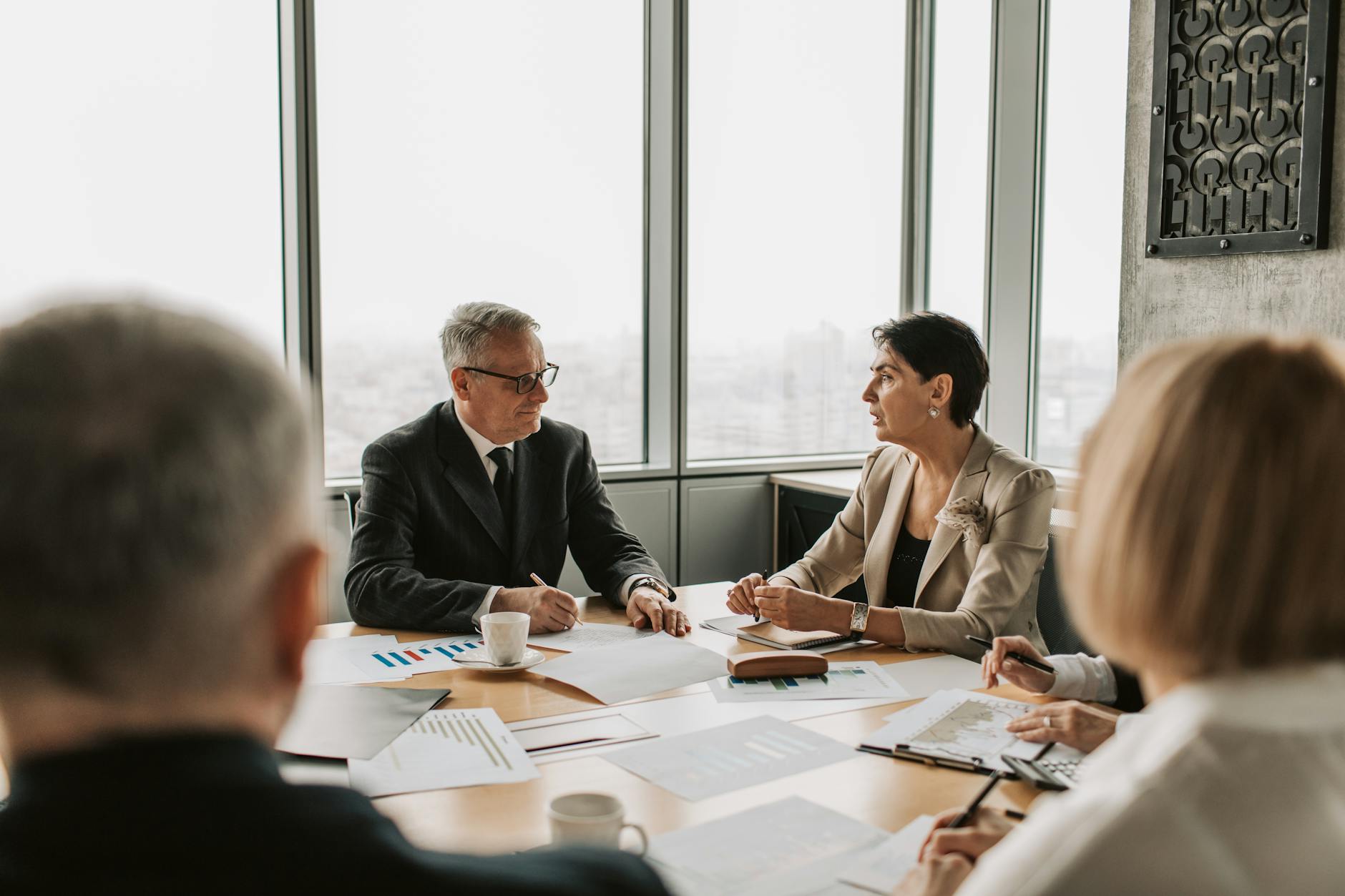 Business professionals in meeting discussing corporate strategy