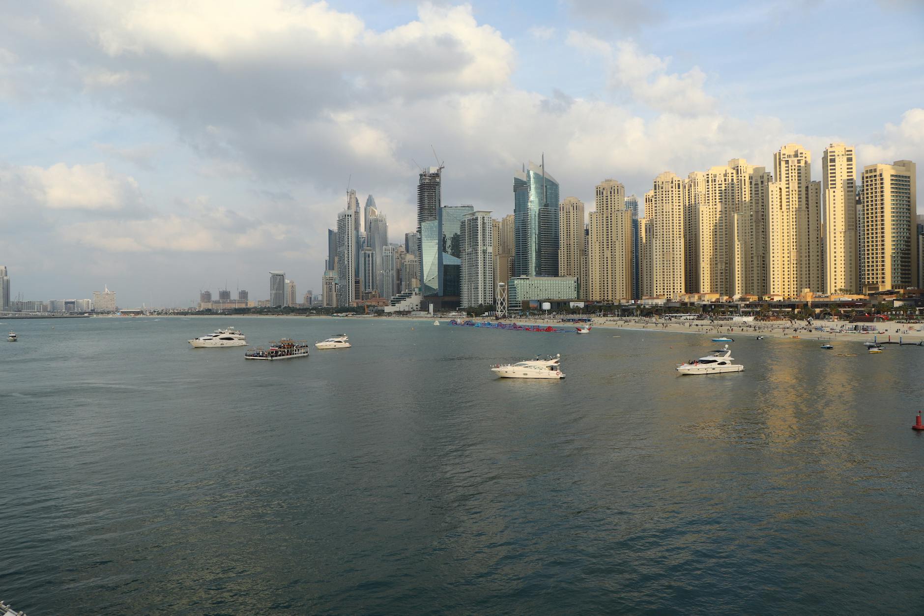 Modern Dubai financial district skyline with glass skyscrapers