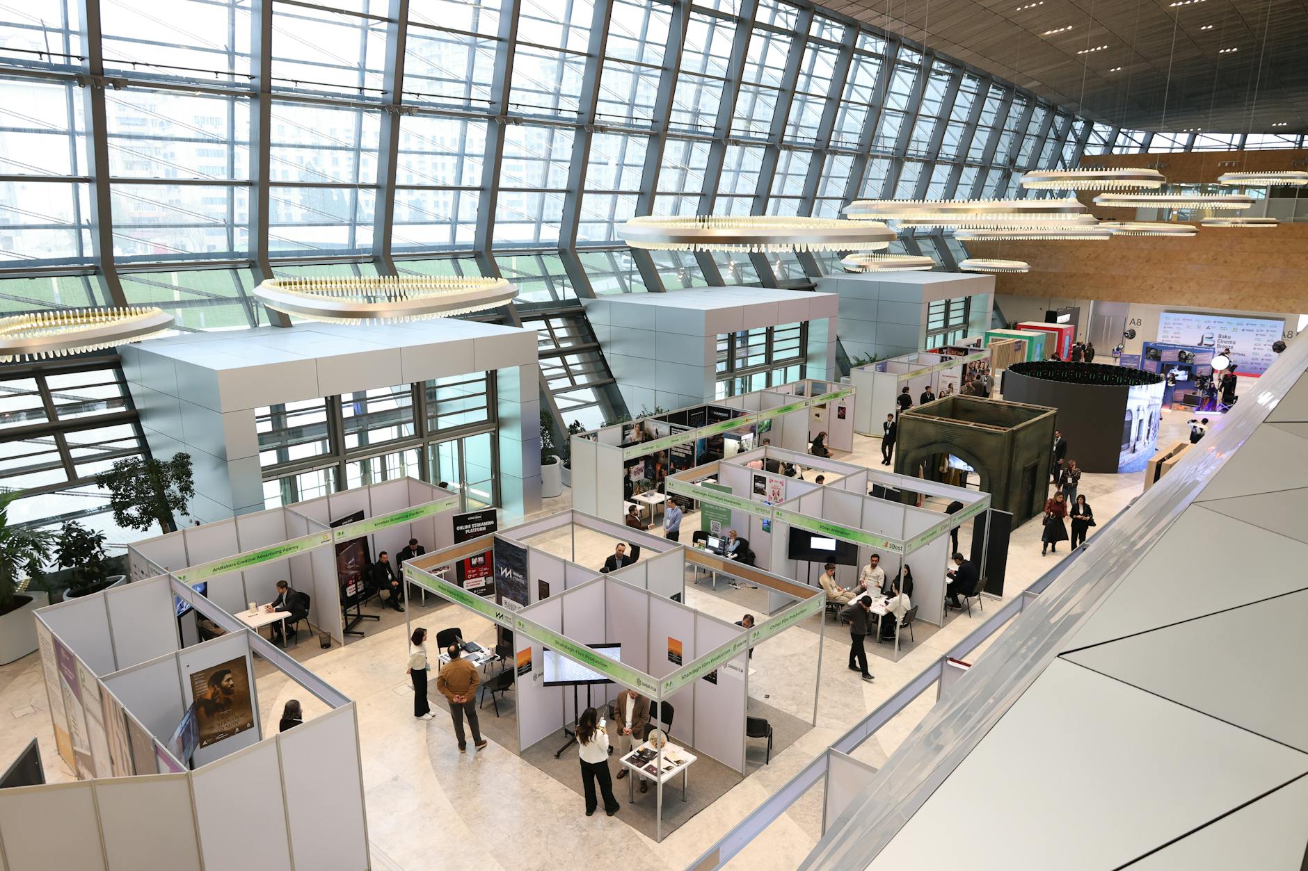 Active trading floor with electronic displays showing market data