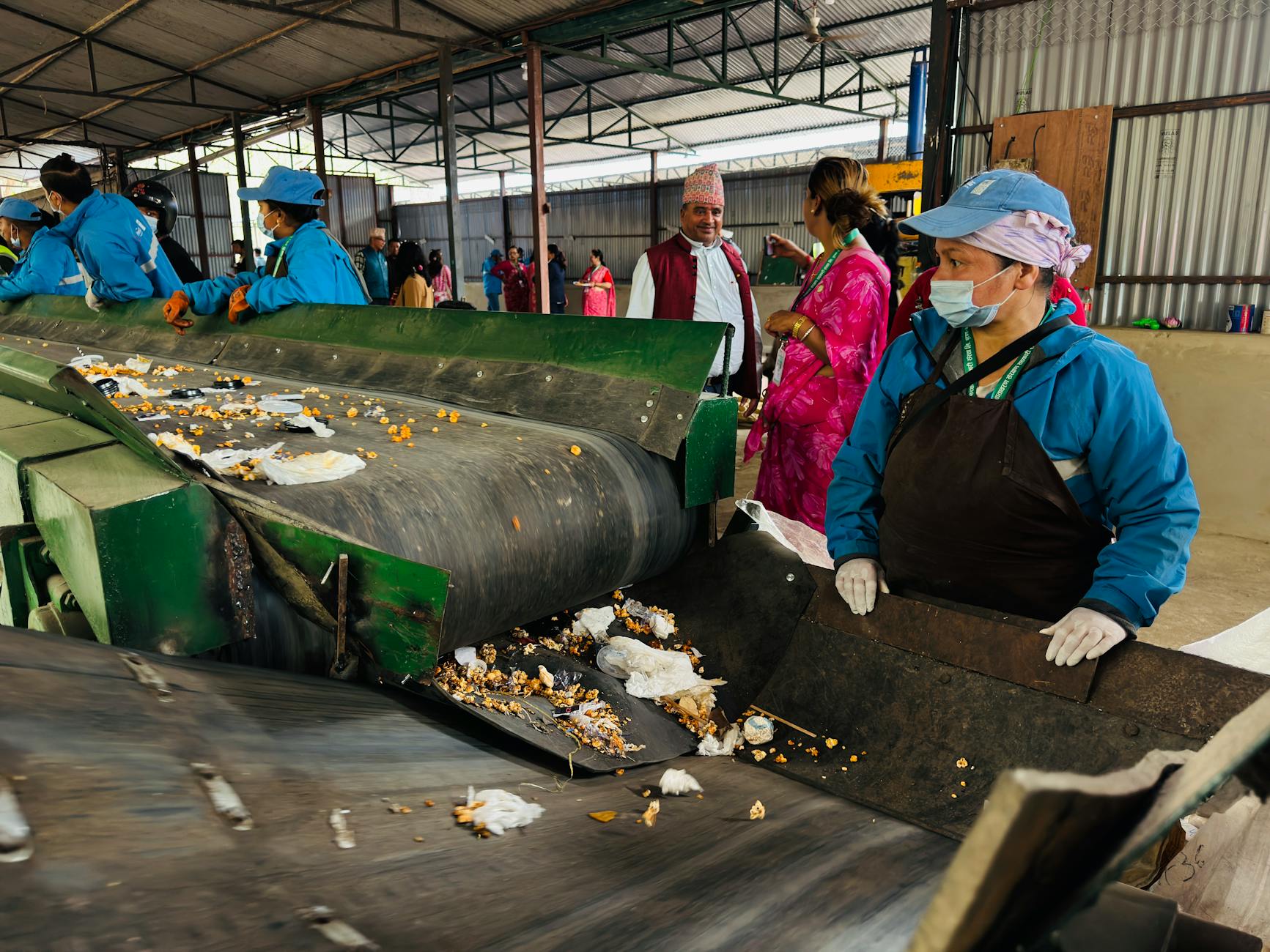 Workers processing environmental cleanup materials