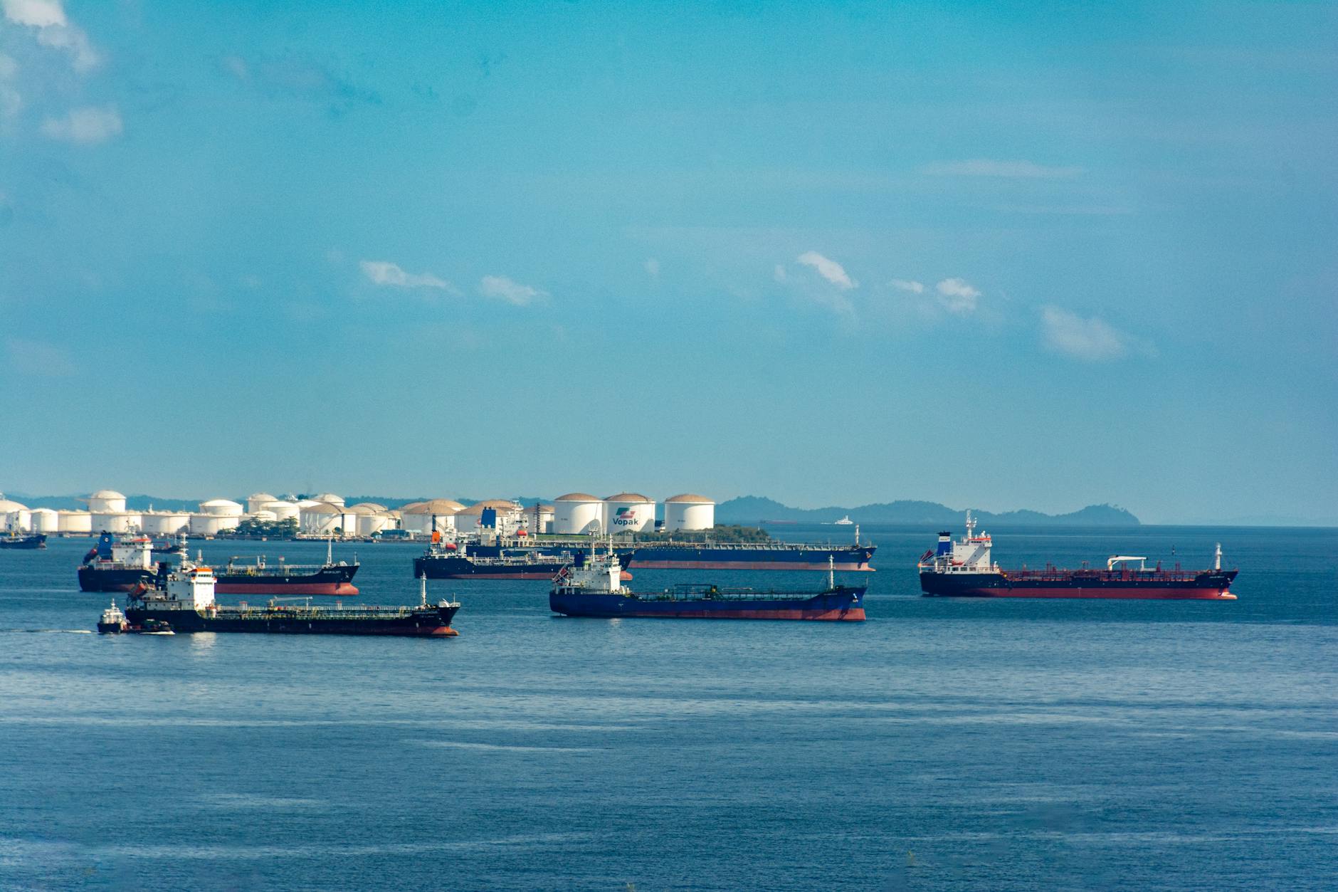 Large commercial oil tanker vessel navigating through waterway