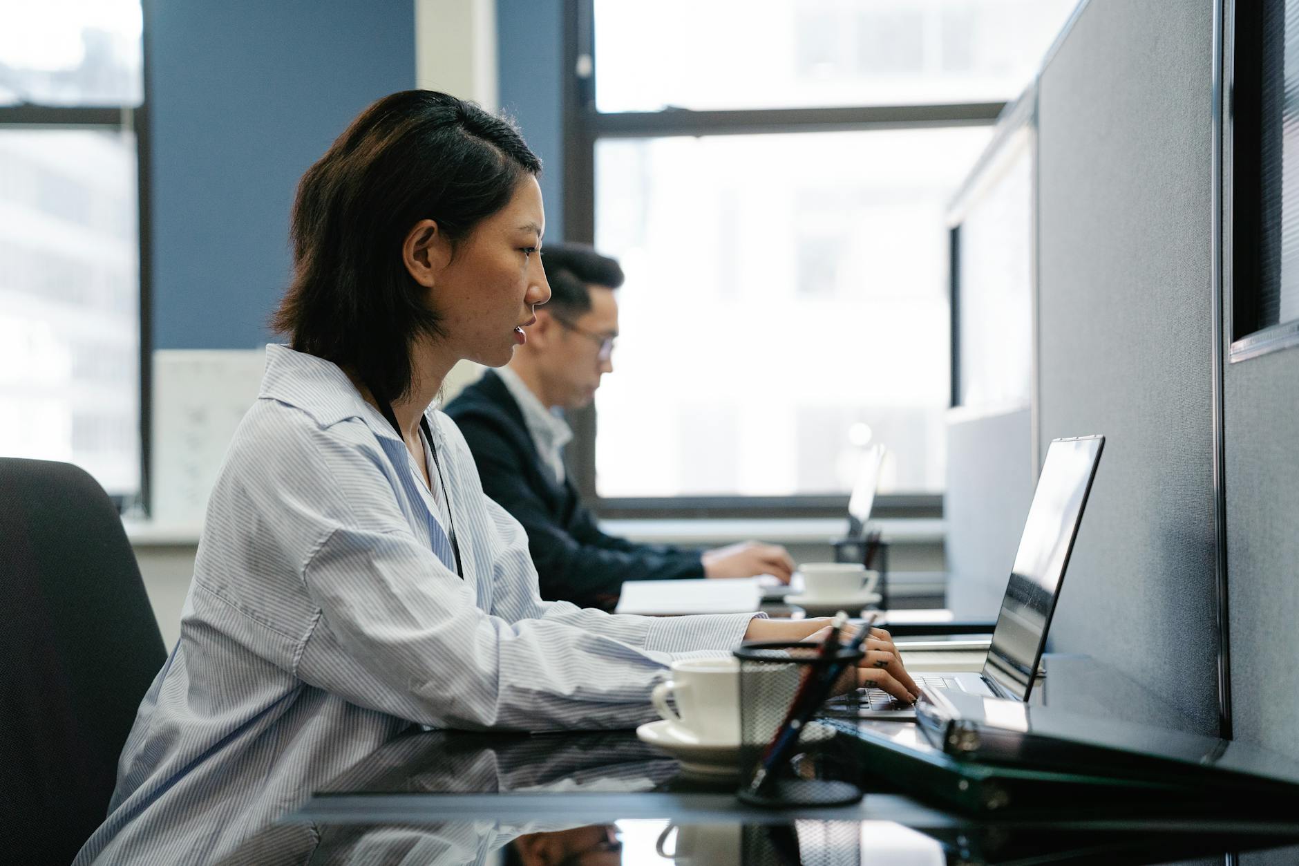 Diverse group of office workers representing large corporate workforce