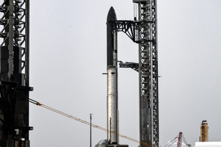 Rocket launching into a clear blue sky representing space industry investment