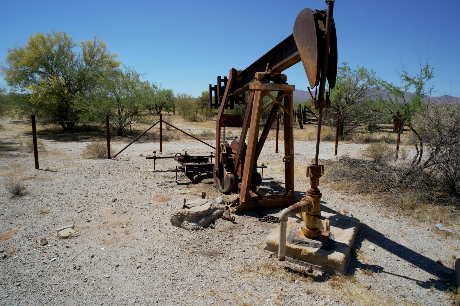 Industrial oil pipeline infrastructure in an open landscape