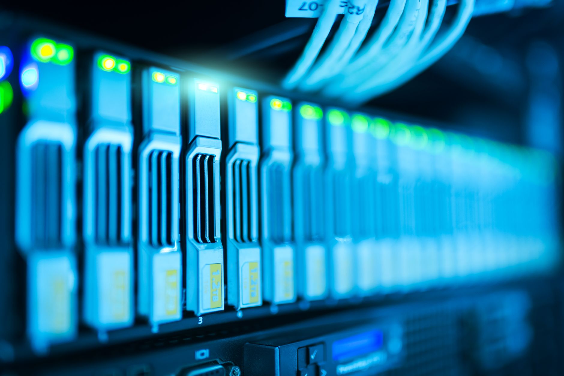 Rows of servers inside a large data center representing AI infrastructure investment