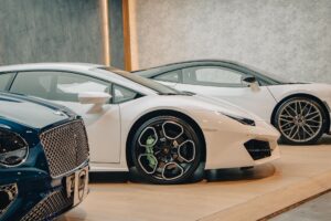 Audi vehicles on display in a premium car showroom