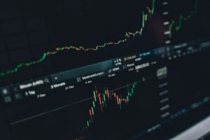 Stock market futures display showing declining numbers on a trading screen