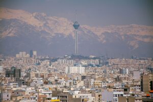 Aerial view of Tehran cityscape representing Iran's political and economic center