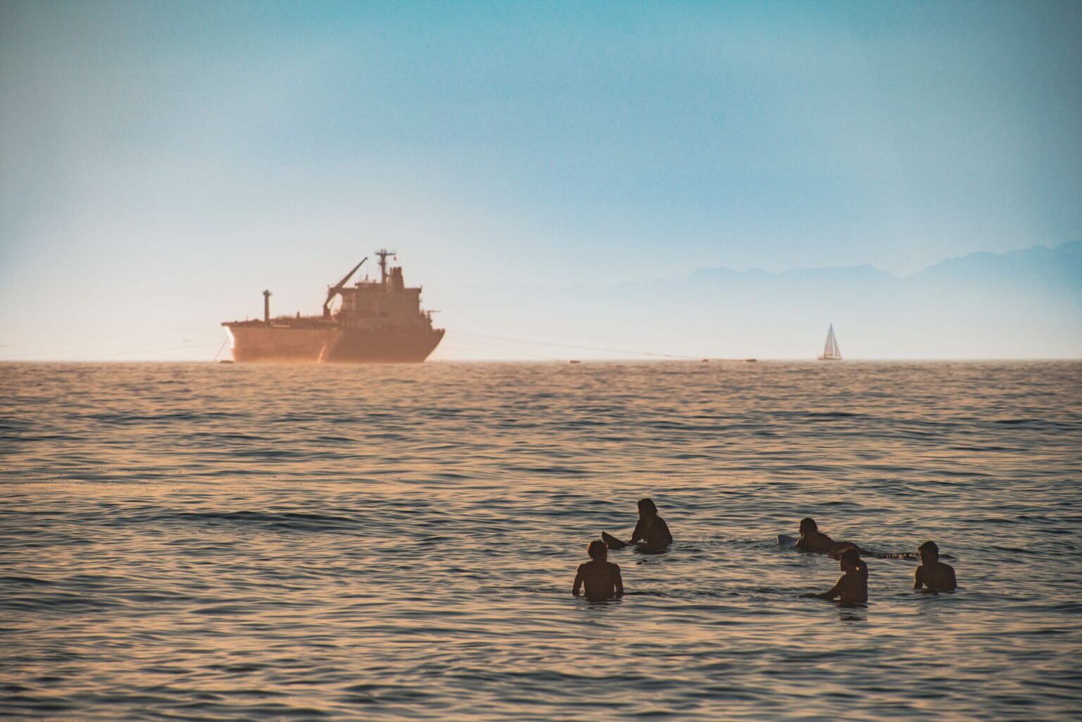 Large oil tanker navigating open ocean waters representing global energy supply chains