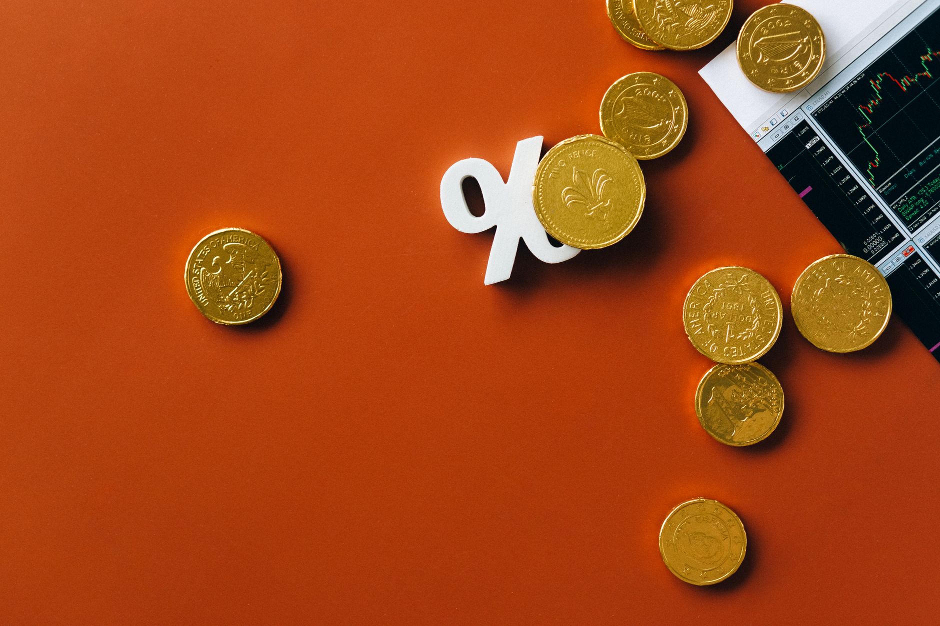 Calculator and cash on a desk representing interest rate comparison