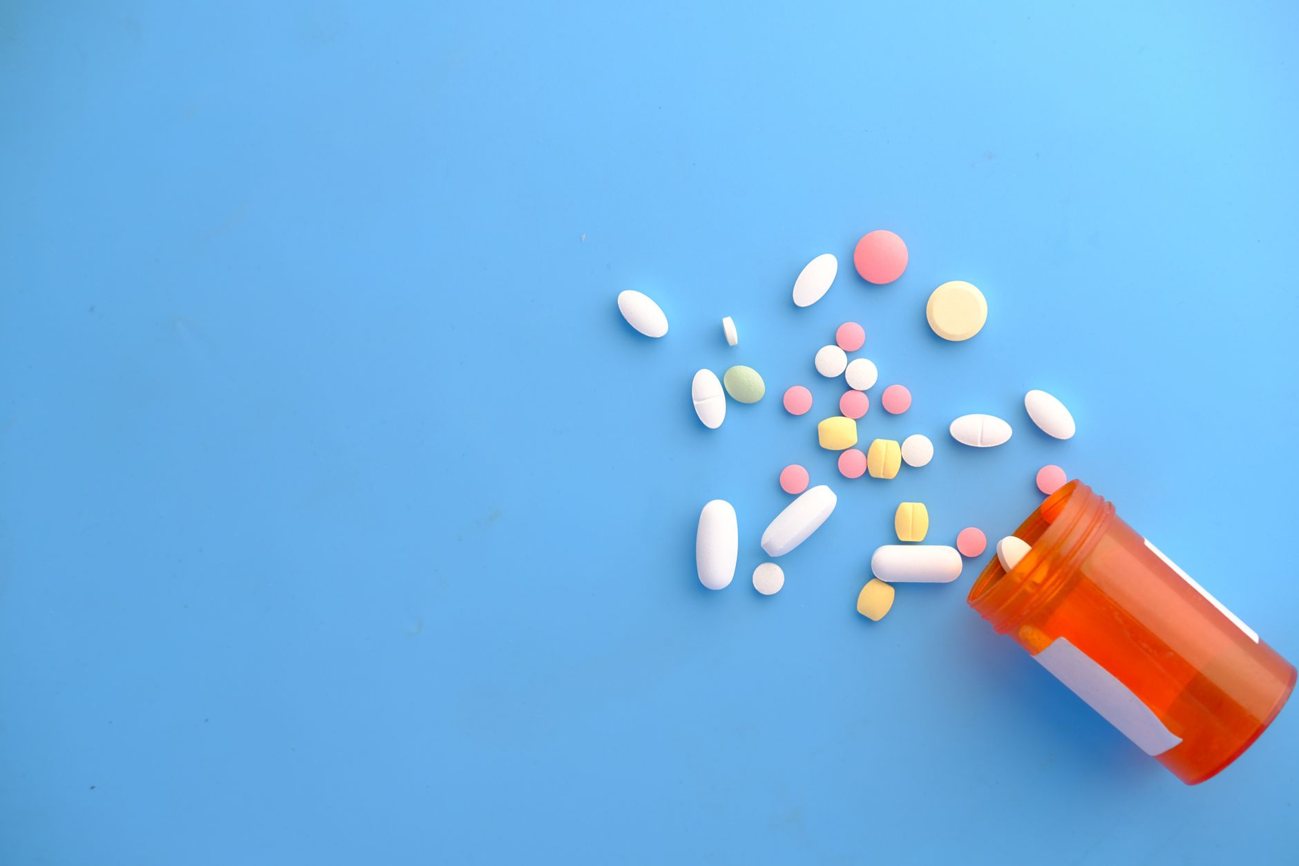 Prescription drug bottles representing obesity and diabetes medications