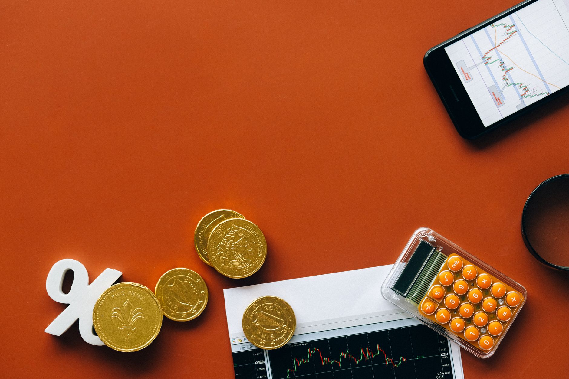 Calculator and financial documents showing interest rate calculations